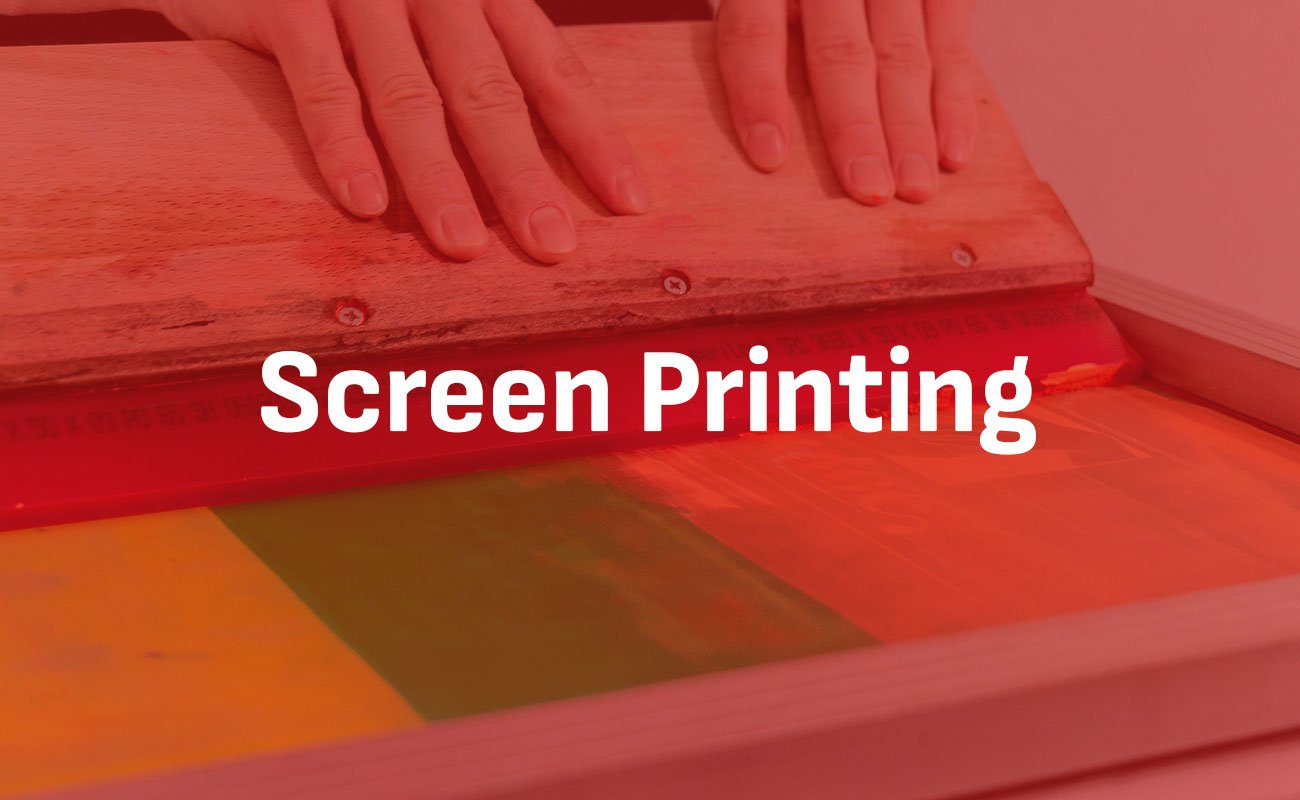 Screen Printing teaser with hands seen in the background pressing ink Screen Printing teaser with hands seen in the background pressing ink